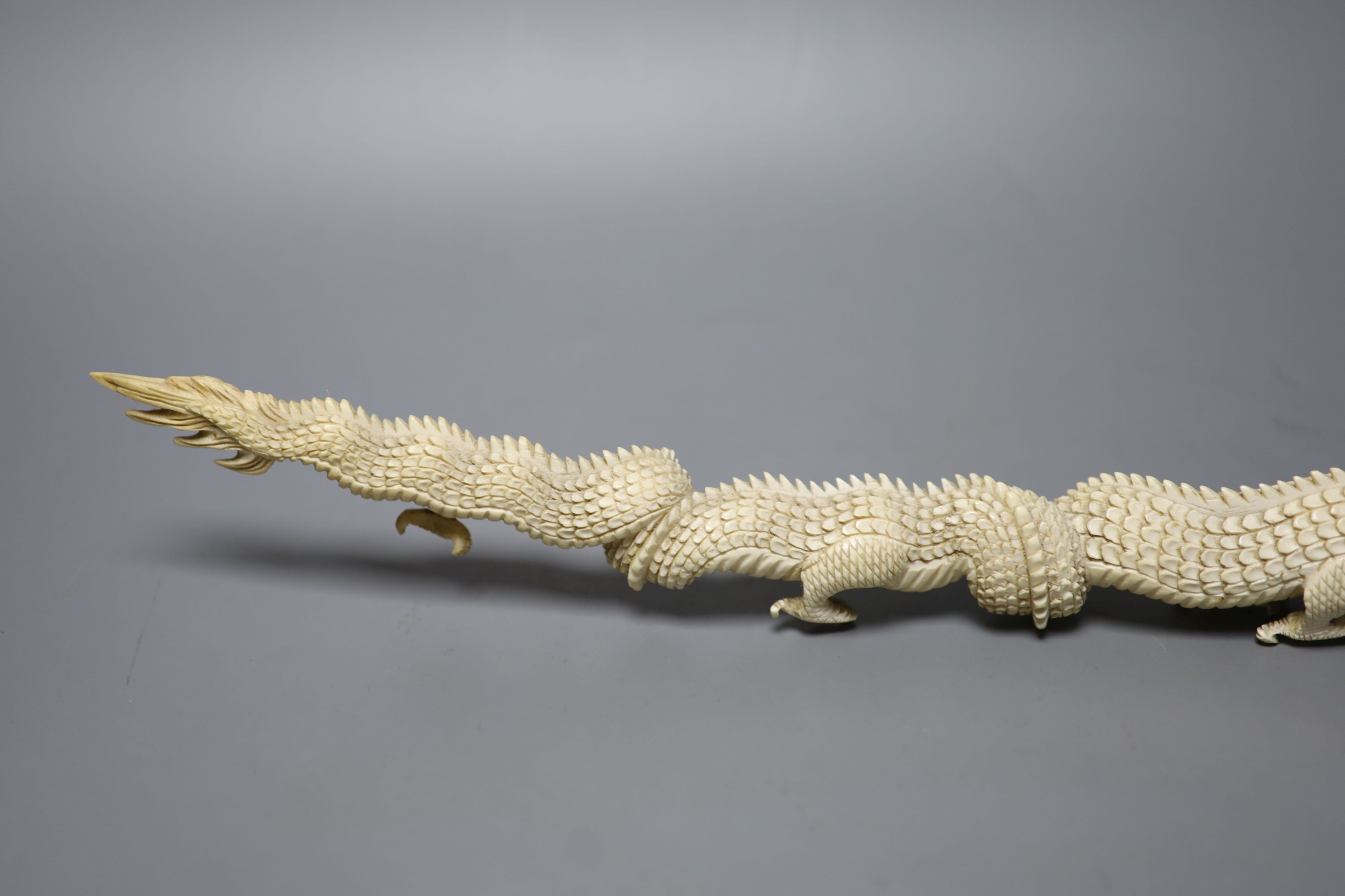 An Indonesian ivory carving of a dragon, first half of 20th century 52cm, , An Indonesian ivory carving of a dragon, first half of 20th century